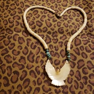 Hand carved MOP eagle and puka shell necklace EUC